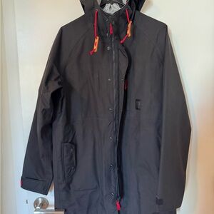 Topo Designs Black rain jacket with Red Details